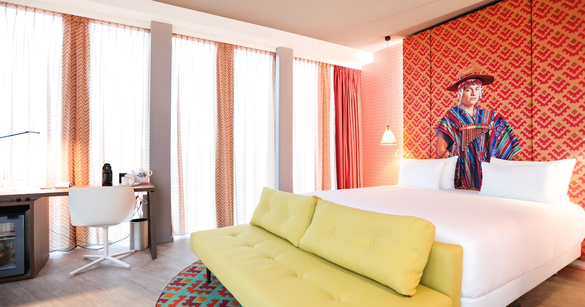 Amsterdamse hotels verlagen kamerprijzen om hogere btw voor gast te compenseren, terwijl kosten juis