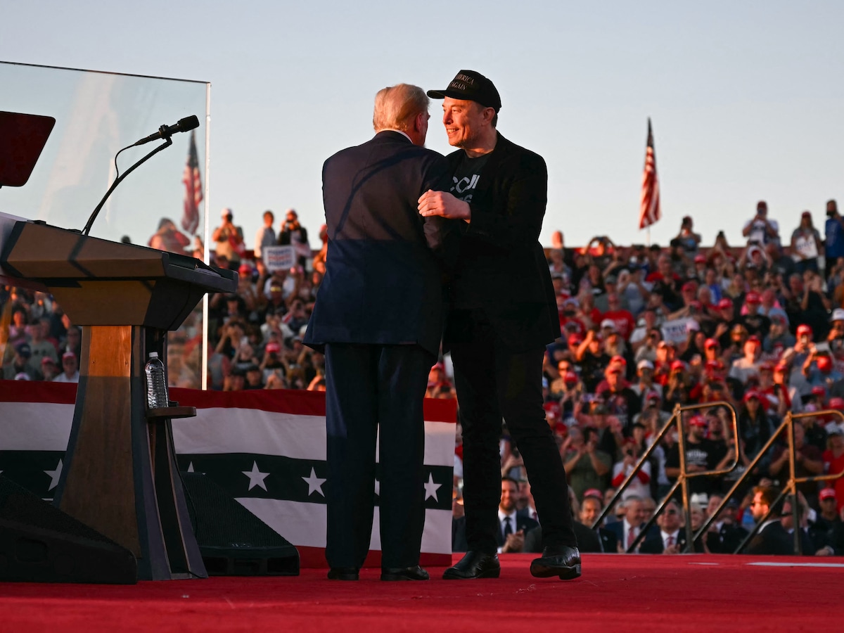 Elon Musk en bitcoinbezitters profiteren van winst Trump: koersen door het  dak | Het Parool