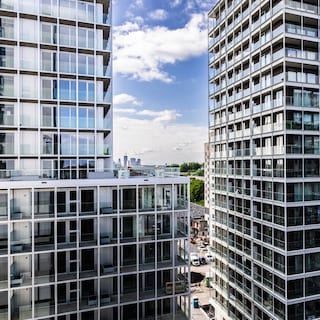 Residential towers The Starling and The Martin are austere, utilitarian, and functional, echoing the no-nonsense philosophy of the Bijlmerbajes