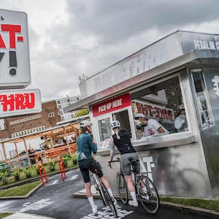 No burgers, but a miso-caramel tiramisu latte: cycling through Oatly’s temporary bike-through in Amsterdam North