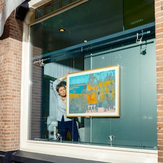 25 years of accessible art in an Amsterdam law firm's windows: 'I see them as gifts for passers-by'