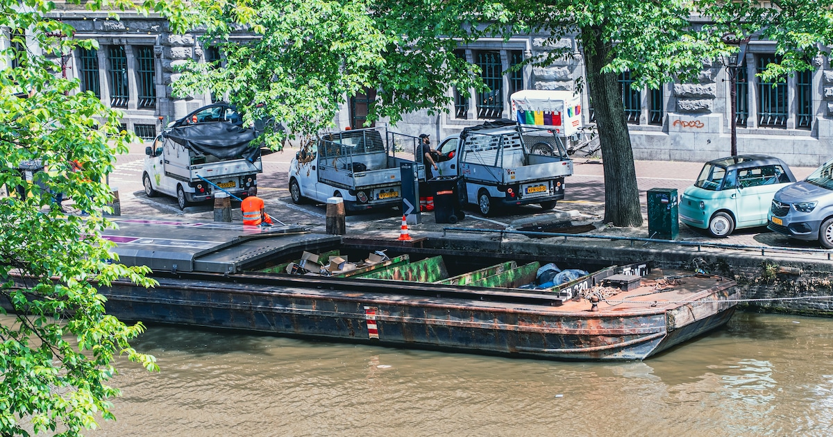 Residents push back against waste boat moored in the heart of Amsterdam: ‘All day you hear the const