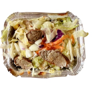 Multiple culinary traditions collide in this delightfully greasy frikandel kapsalon