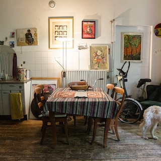The squatted fire station where Myriam (65) lives is a fantastic cool tropical house