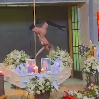 Funeral of Amsterdam couple goes viral: pole dancer performs for deceased pair who ran Red Light District nightclub