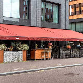 Spaans restaurant onder woontoren op Zuidas mag blijven grillen, bewoners hebben onvoldoende bewijs voor brandonveiligheid