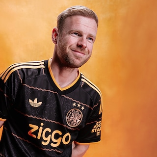 Ajax presents new black and orange away kit, with subtle references to club history