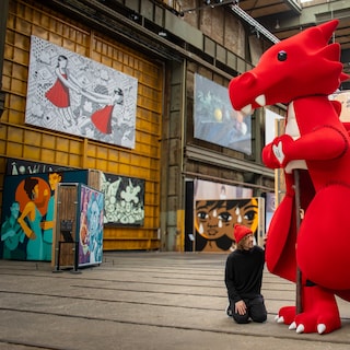 Interactive artwork Lucky Dragon at NDSM wharf: high-five Little Frankey to light up the dragon's heart