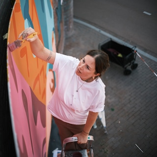 The bittersweet message on Amsterdam's Haringpakkersbrug by artist Hedy Tjin: 'These melting ice creams symbolize an earth on fire'