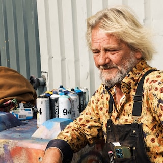 Flowerbikeman Warren Gregory on his clashes with police and justice as he leaves Amsterdam: 'I've had more trouble here than in forty years in America'