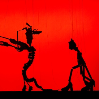A magnificent storyteller gave Georg Baselitz's puppets an identity at the Muziekgebouw