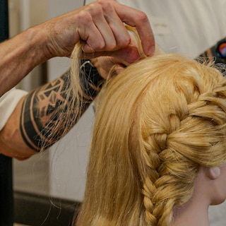 At the Dads and Ponytails workshop, fathers learn how to braid their daughters' hair: 'It’s actually very simple'