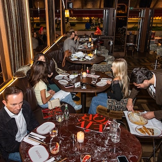 Order snacks and a big bottle of wine at Rotate, but dine elsewhere (5.5)
