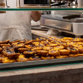 How residents of Lisbon and Barcelona are protecting their culinary traditions: ‘A symbol of a much larger problem’