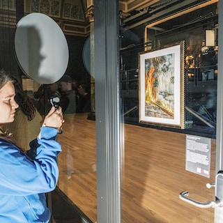 Climate activists hang illegal art in Rijksmuseum: 'They need to be careful with greenwashing by ING'