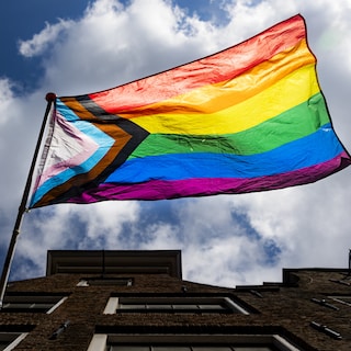 Amstelkade residents hang pride flags after family threatened with brick through window: ‘We won’t accept this’